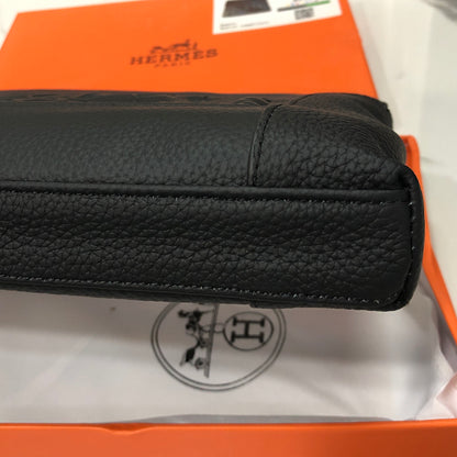 Black embossed horse and carriage leather zipper pouch