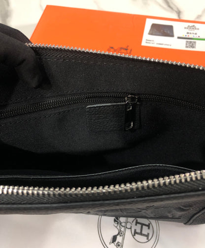Black embossed horse and carriage leather zipper pouch