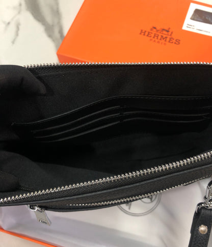 Black embossed horse and carriage leather zipper pouch