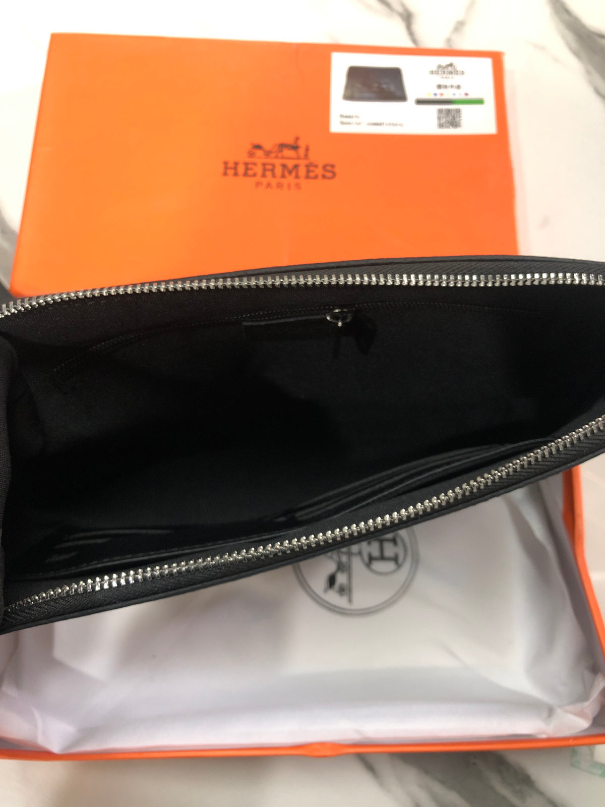 Black embossed horse and carriage leather zipper pouch